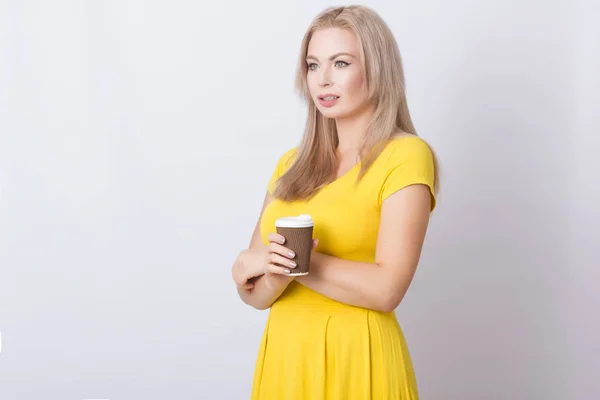 Cute Blonde Woman Yellow Dress Holding Coffee Cup Her Hands — Stock Photo, Image