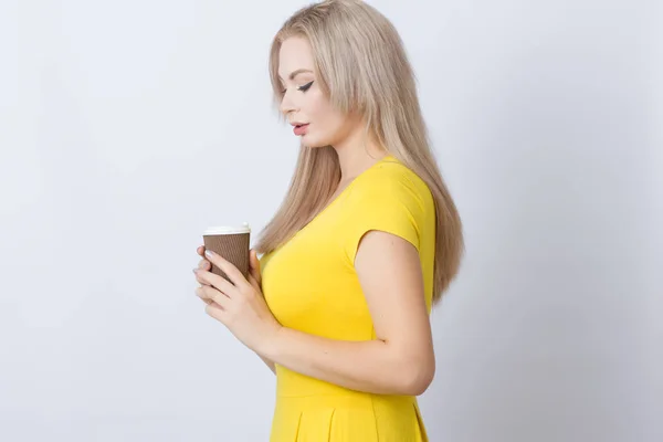 Cute Blonde Woman Yellow Dress Holding Coffee Cup Her Hands — Stock Photo, Image