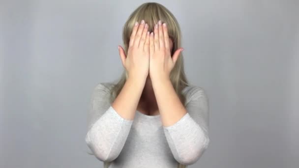 Funny Young Blonde Woman Showing Different Faces Grey Background Studio — Stock Video