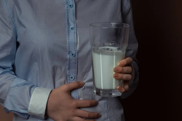 girl drinks milk and is happy