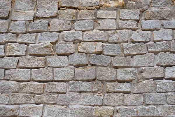 天然石の背景で作られた抽象的な壁の柵です — ストック写真