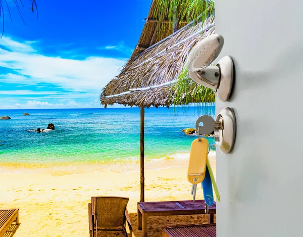 open door with access to the beach view of palms