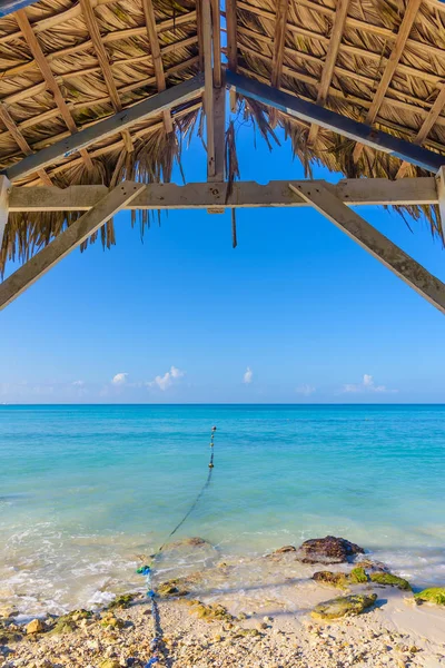 Hot tropical day the Caribbean sea pier with pergola — Stock Photo, Image