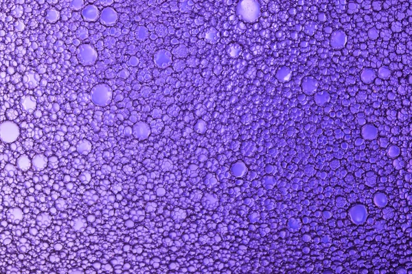 Background of oil droplets on the water surface.