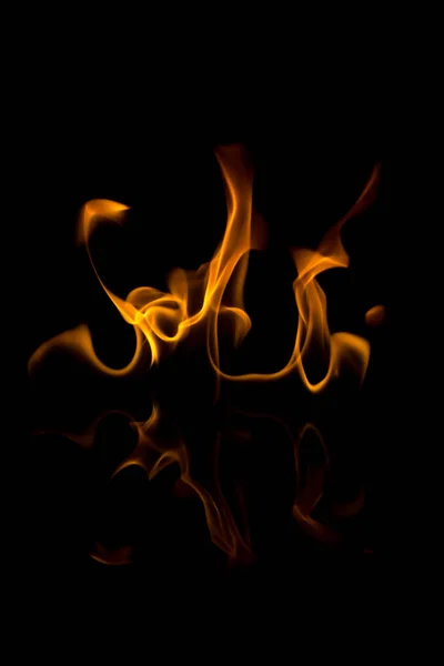 Flames with a black background. Close up. — Stock Photo, Image