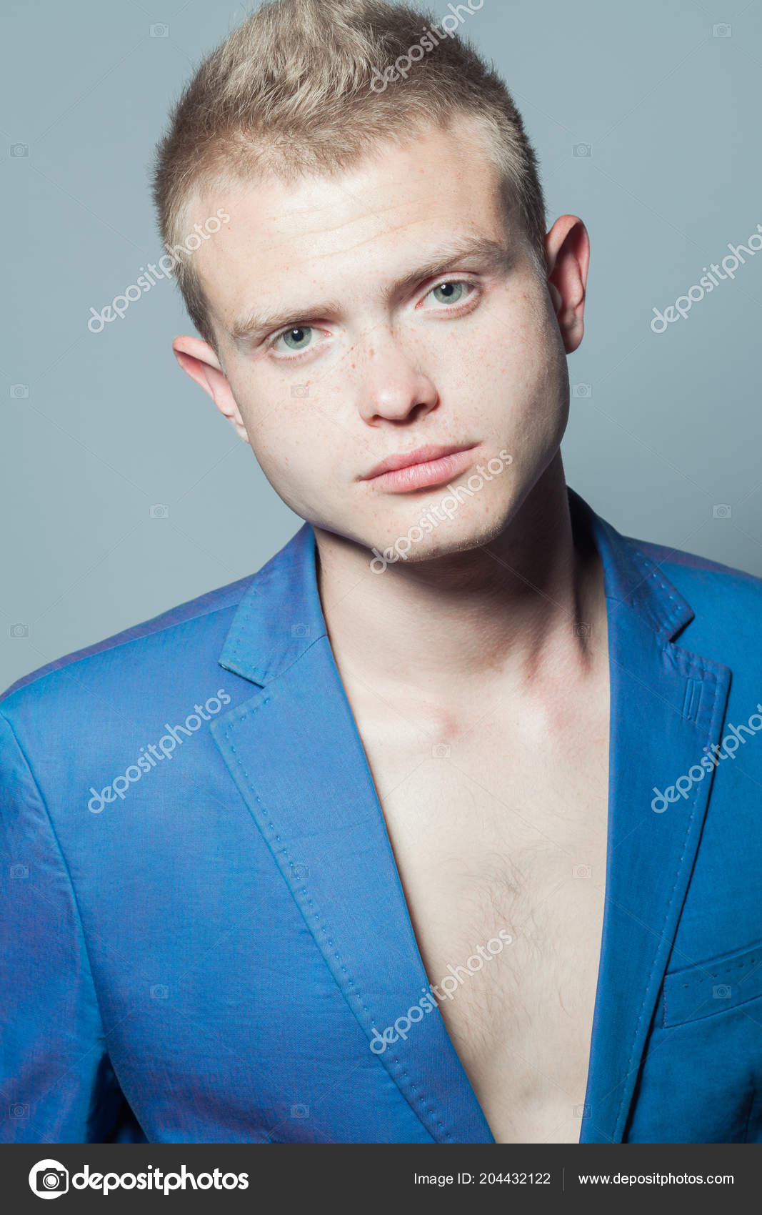 Male Beauty Concept Portrait Young Man Perfect Haircut Wearing Blue Stock  Photo by ©avgustino 204432122