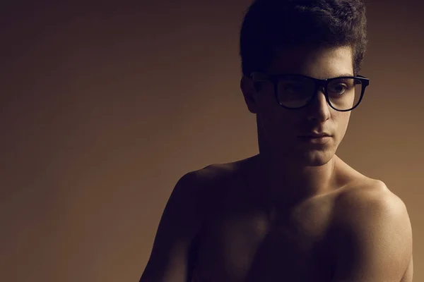 Male beauty concept. Portrait of fashionable young man with stylish eyewear — Stock Photo, Image