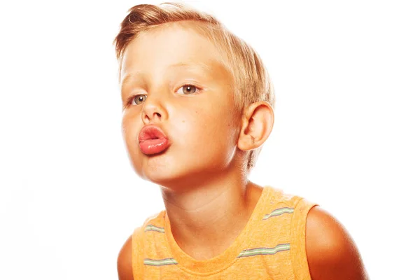 Mom's joy concept. Portrait of cute little boy in orange sleeveless t-shirt — Stock Photo, Image