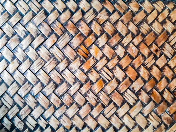 Brown weave background, wicker background, Bamboo wooden texture for background, Bamboo texture and background close up, Weave bamboo, handcraft bamboo weave texture abstract