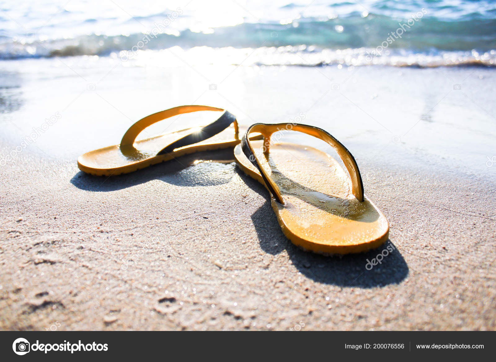 slippers on the beach