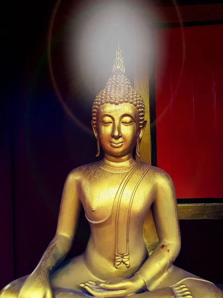 golden buddha statue, The face of gold buddha statue, Close up of the old Thai buddha with wooden wall background in art of religion concept