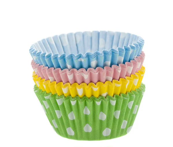 Copos de papel de assar coloridos para cupcakes ou muffins — Fotografia de Stock
