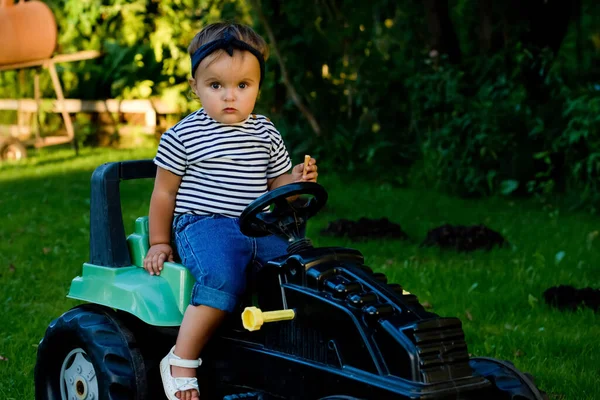 Baby Girl Playing Toy Tractor Garden Closeup — Stock Photo, Image