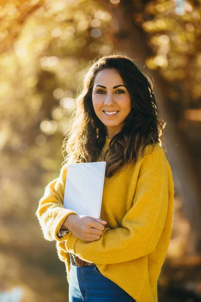 Cheerful Casual Young Woman Holding White Book Autumn Outdoor — Stock Photo, Image