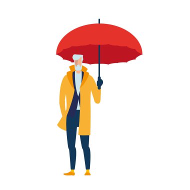 Adam şemsiyesi altında. Yaşlı bir adam bir şemsiye ile sarı bir pelerin içinde.