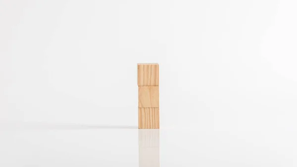 つの木製のブロックをコピー スペースの白いテーブルの上空します — ストック写真