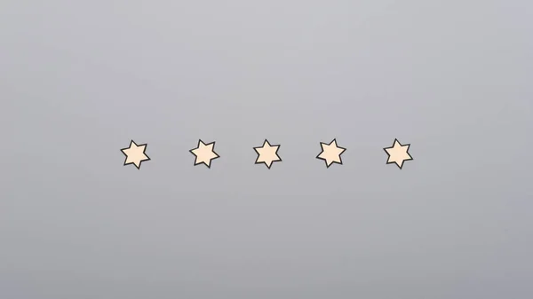 Five Paper Cut Stars Placed Row Grey Background Conceptual Grading — Stock Photo, Image
