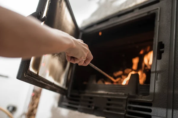 Low Angle View Woman Arranging Ashes Logs Iron Poker Burning — Stock Photo, Image