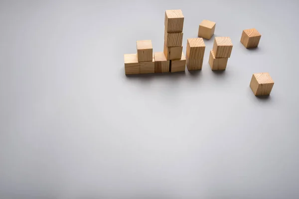 Wooden Blocks Stacked Scattered Grey Background Copy Space — Stock Photo, Image