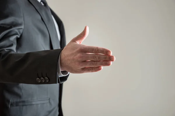 Businessman Standing Left Side Image Offering His Hand Handshake Grey — Stock Photo, Image