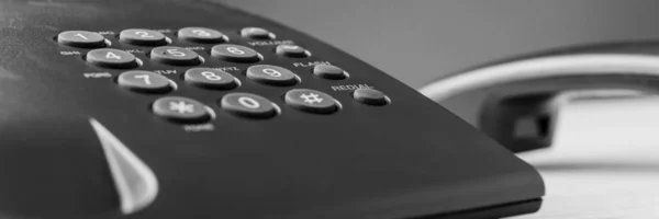 Wide view image of black landline telephone keypad — Stock Photo, Image