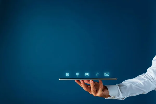 Digital tablet with glowing interface contact and information ic — Stock Photo, Image