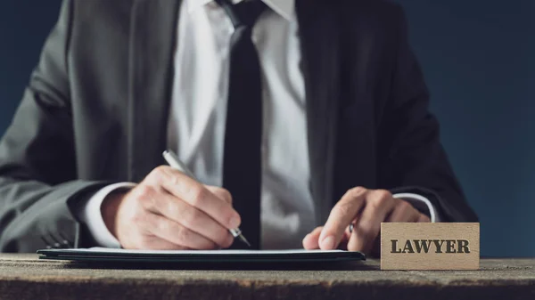 Lawyer signing legal document — Stock Photo, Image