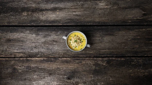 Top view of a bowl of delicious and healthy vegan yellow lentil soup served with scoop of rice. — Stock Image Top View Bowl Delicious Healthy Vegan Yellow Lentil Soup Served Stock Picture
