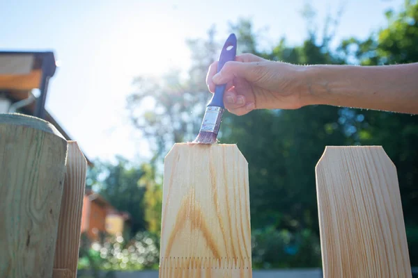 Low Angle View Female Hand Painting New Wooden Fence Transparent — Stock Photo, Image