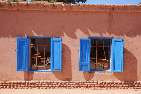 Traditional Style Windows Colorful Blue Shutters Enhance Building Remote San Stock Picture