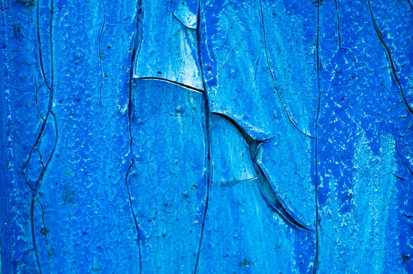 Eski ahşap arka plan ağaç eski boya artıkları parçaları kalıntıları ile. Doku eski ağaç bir kurulu ile boya.