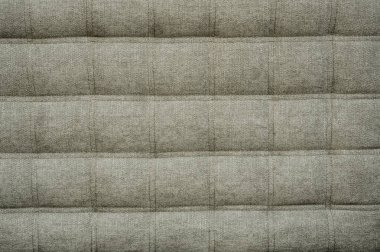 Koç türü kumaş Örtüleme şap düğmeleri ile sıkılır. Doğal chesterfield stil kapitone döşeme zemin kapatın. arka plan doku