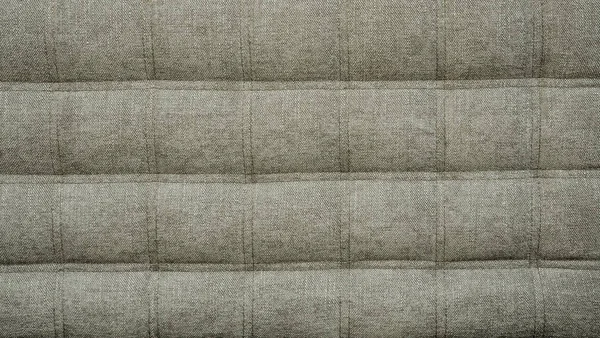Koç türü kumaş Örtüleme şap düğmeleri ile sıkılır. Doğal chesterfield stil kapitone döşeme zemin kapatın. arka plan doku