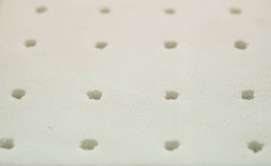 Doğa para lateks lastik delikli, yastık ve yatak malzemesi. Bir yatak doldurma kavramı. Teknoloji kavramı