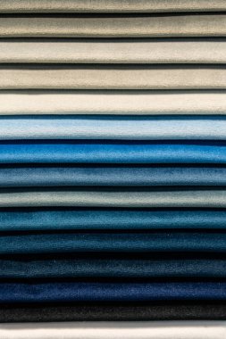 Çok renkli kumaş örneklerinin kataloğu. Tekstil endüstrisi geçmişi. 