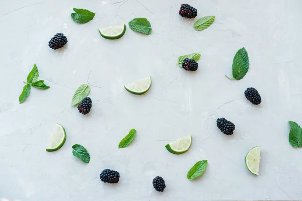 Flat Lay Composition Lime Blackberries Mint Gray Background Top View — Stock Photo, Image