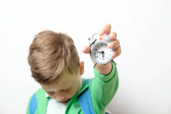 Sleepy Yawning Schoolboy Blue Backpack Alarm Clock White Background — Stock Photo, Image