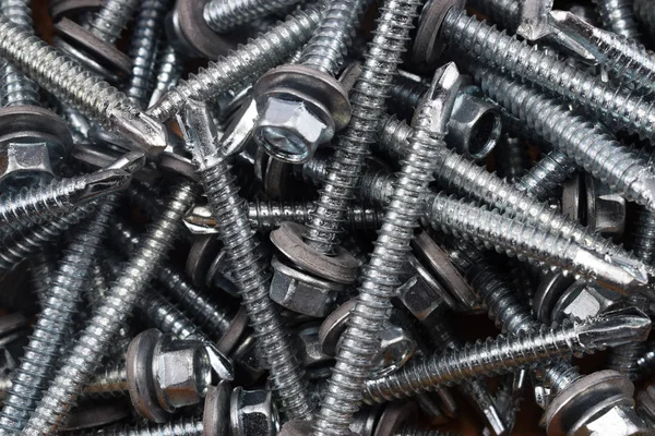 Background Lots Screws Lie Together — Stock Photo, Image