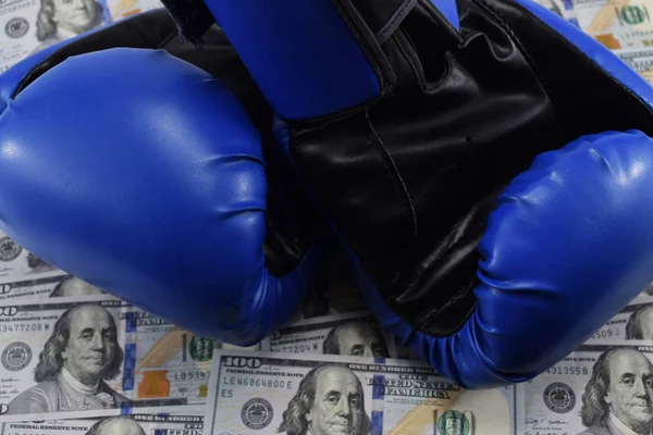 sport for money, boxing for money. dollars and boxing gloves