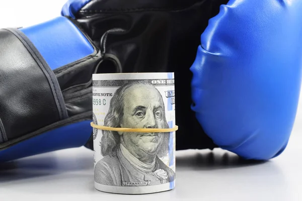 sport for money, boxing for money. dollars and boxing gloves
