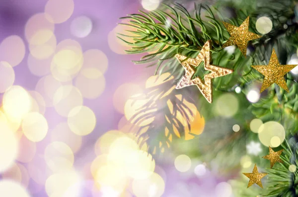 Christmas tree background and Christmas decorations with star,blurred, sparking, glowing. Happy New Year and Xmas theme Stock Photo