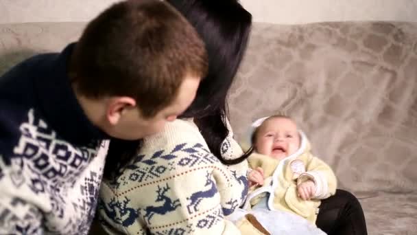 Young Parents Winter Sweatshirts Hold Baby Arms Communicate — Stock Video
