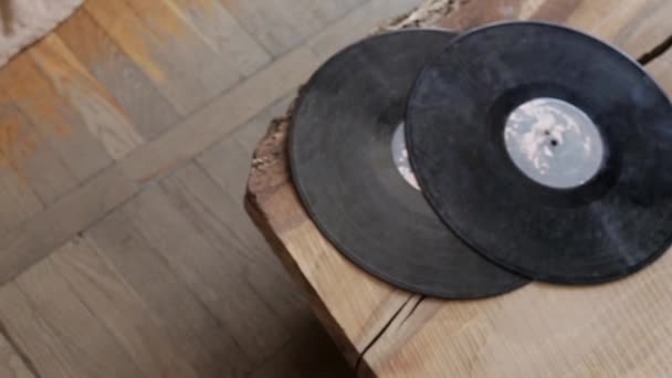 Two Old Vinyl Records Lie Edge Table Top View — Stock Video