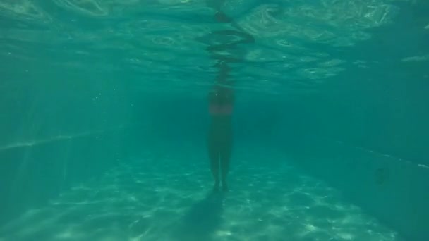Young Slim European Swims Slowly Underwater Pool — Stock Video