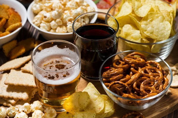 beer and an assortment of snacks, top view, horizontal