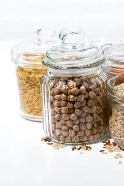 Assortment Cereals Legumes Glass Jars White Background Closeup — Stock Photo, Image