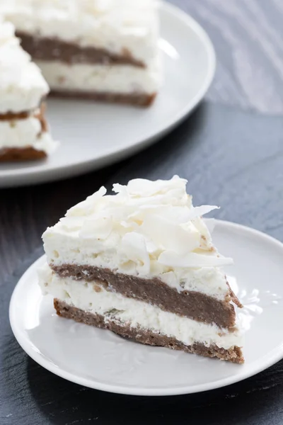 Piece Chocolate Cake Coconut Cream Plate Vertical — Stock Photo, Image