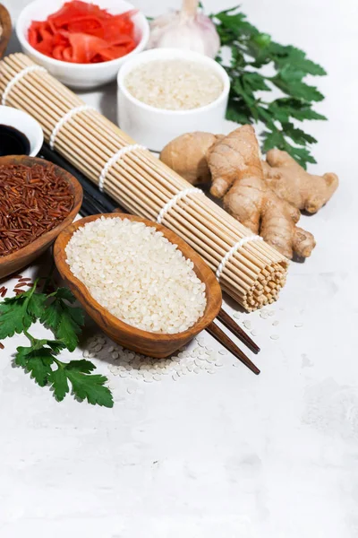 products for Japanese cuisine, rice, ginger and herbs, top view