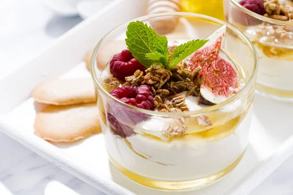 sweet greek yogurt with honey and fresh figs, closeup, horizontal