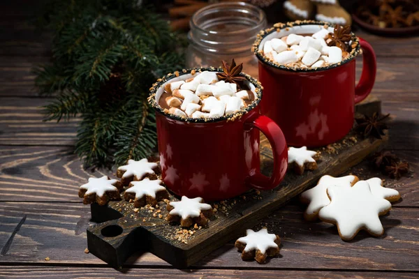 cozy winter drink hot chocolate on a wooden background, top view horizontal